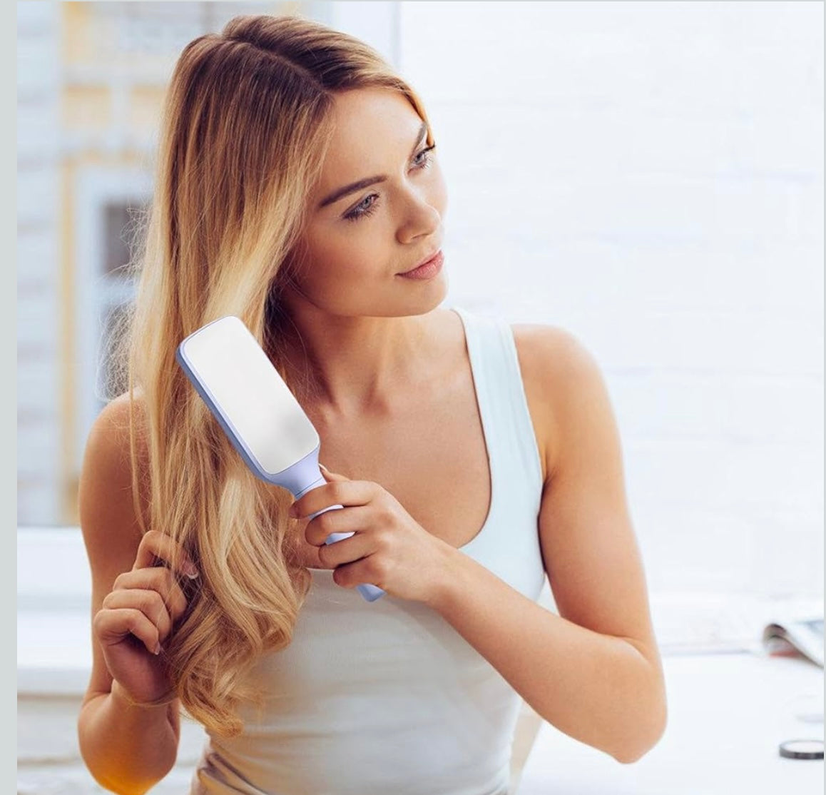 Cepillo de pelo autolimpiante